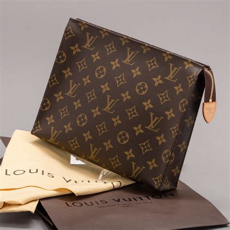 louis vuitton toiletry pouch 26 as a clutch|louis vuitton monogram pouch.